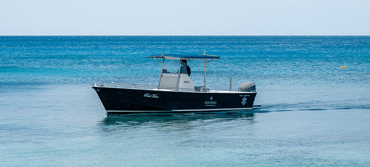 Fishing boat 'Reel time' out on the water off the coast of Kokomo Private Island Fiji